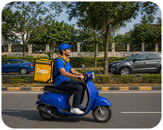 CAPS delivery scooter on the road